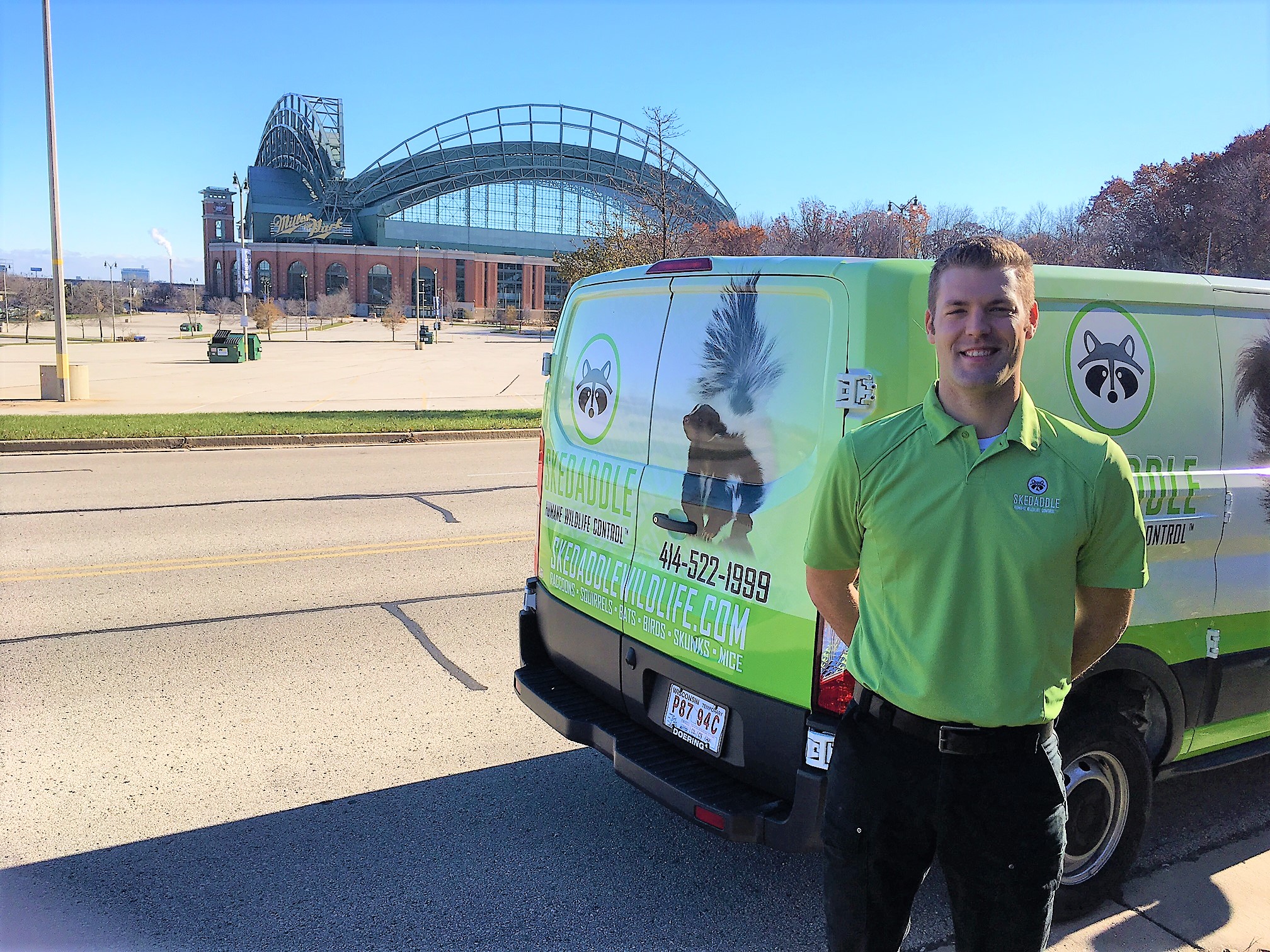 home services franchise guy standing in front of truck